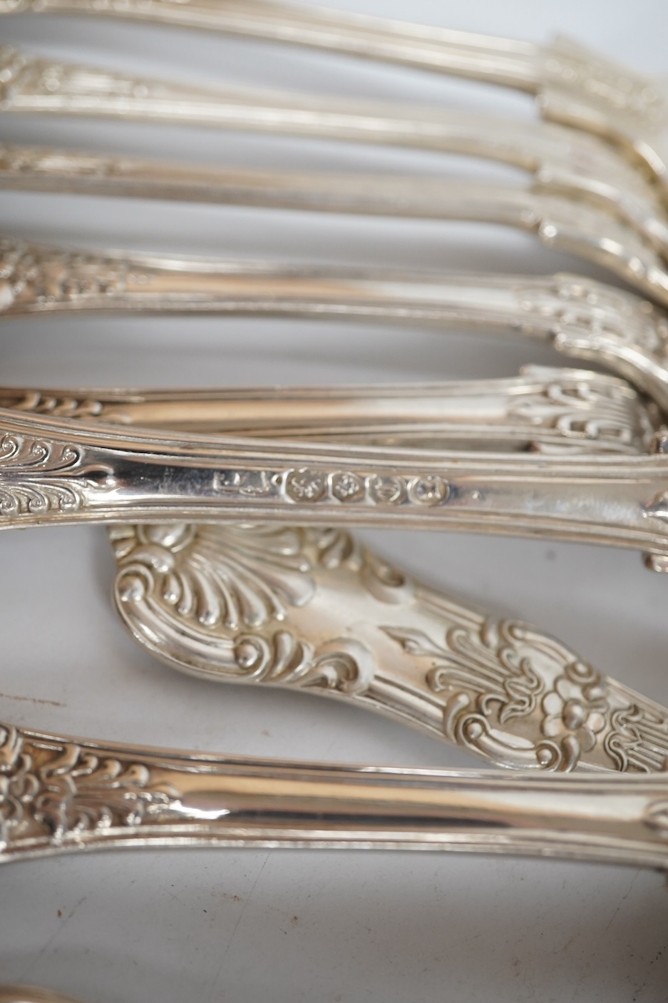 Eleven early Victorian silver Queens pattern dessert forks, by Joseph & Albert Savory, London, 1838, together with a set of four similar table spoons, William Eaton, London, 1838 and two later silver King's pattern table